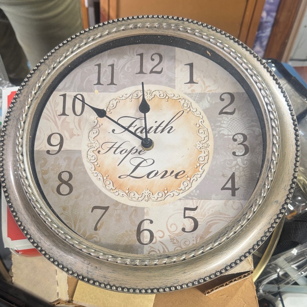 Elegant Silver Wall Clock with Inspirational Design